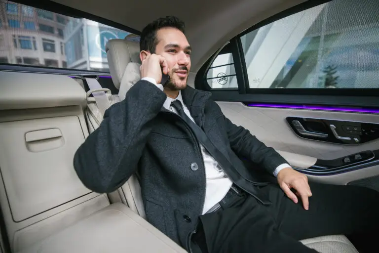 | X Chauffeurs Businessman Enjoying Comfortable Ride in Executive-car-hire-london